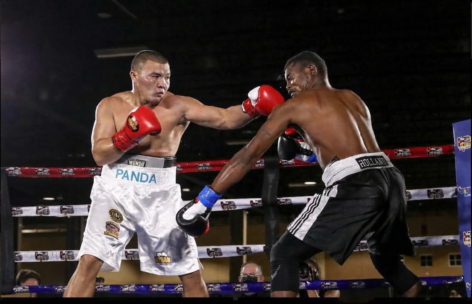 Serik Musadilov landing a straight right hand on his opponent